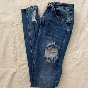 Dark blue high waisted ripped jeans
